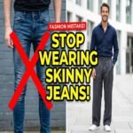 A stylish man wearing wide leg trousers men instead of skinny jeans